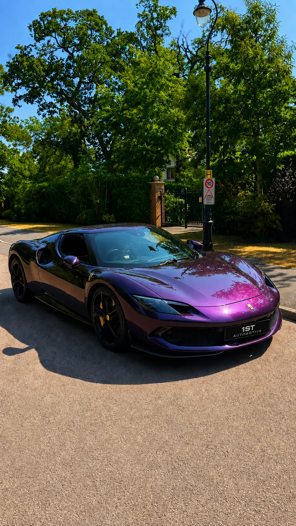 Ferrari 296 GTB in a colour-shift purple gloss wrap